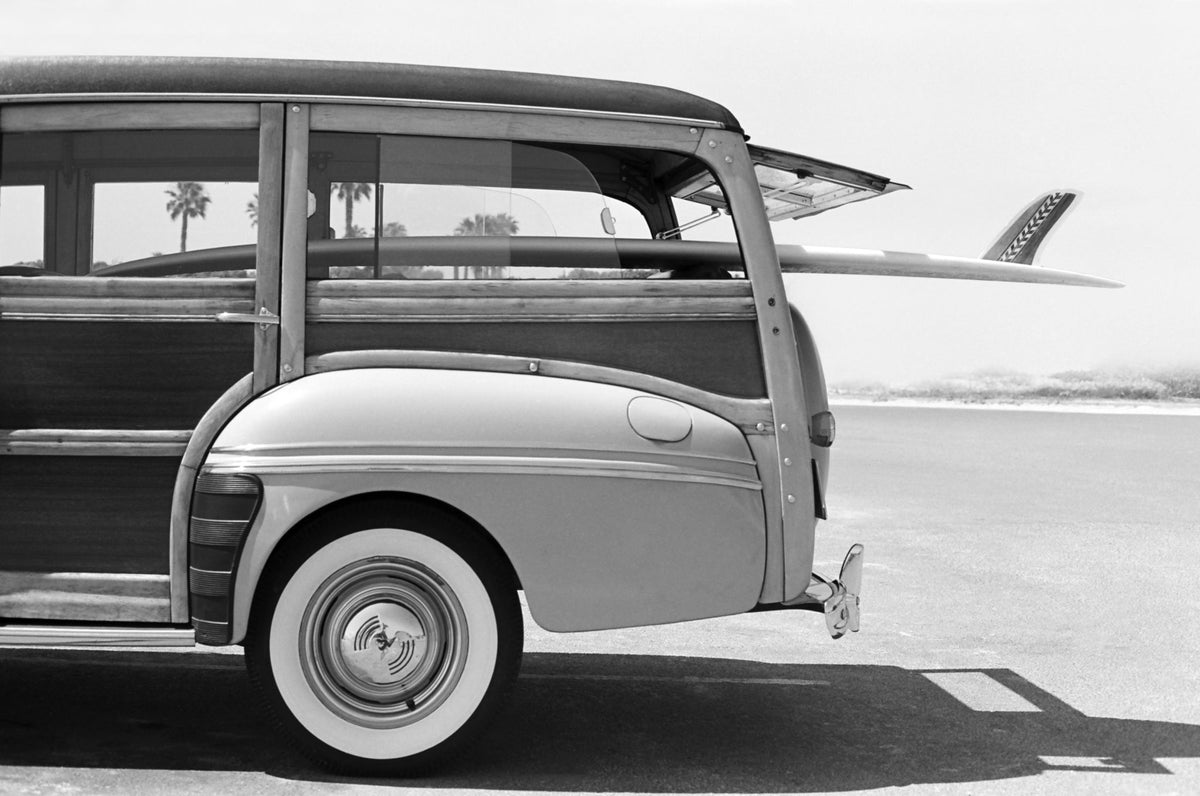 Vintage Woody Station Wagon with Surfboard