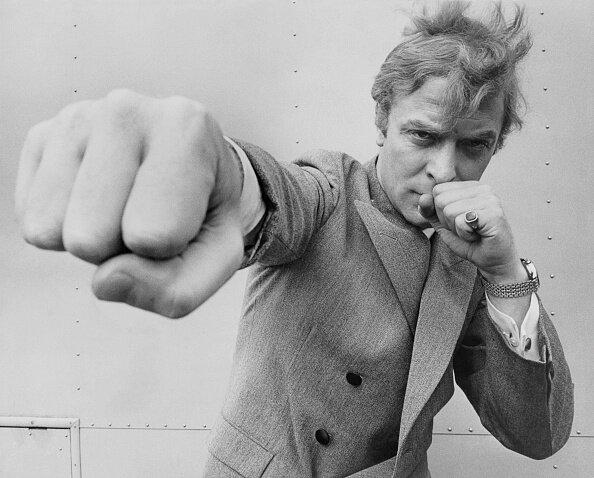 Michael Caine Throwing a Punch by Stephan C. Archetti photo for sale Getty Images Gallery