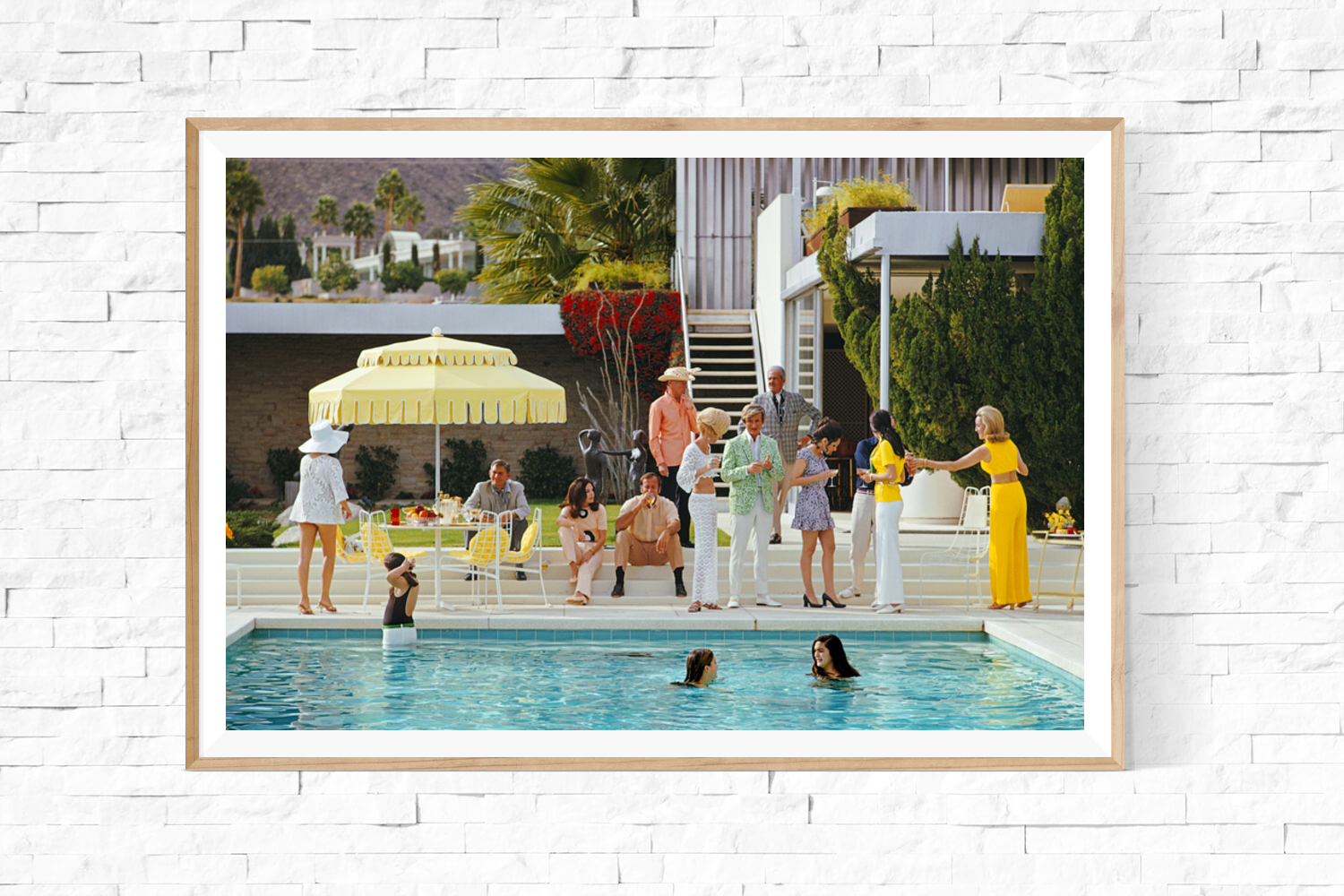 Framed Slim Aarons: Poolside Gathering Palm Springss photo for sale Getty Images Gallery
