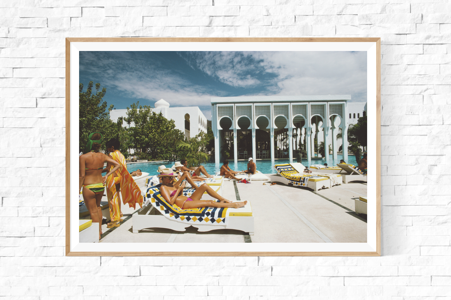 Framed: Slim Aarons: Armando's Beach Club poolside photo for sale Getty Images Gallery